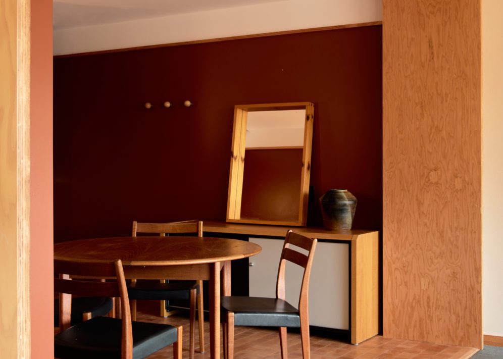 A dining table with 4 chairs provides a place to sit and talk